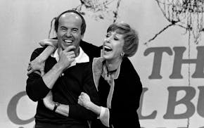 Carol Burnett, right, laughs with Tim Conway during taping of her final show, in Los Angeles.
