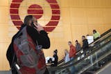 Target employees were once again filing out of Target Corporate headquarters in Downtown Minneapolis Wednesday afternoon with boxes of personal belongings after Target Corp. announced they would be laying off about 550 employees who work in the Twin Cities as it continues to wind down its Canadian business.
