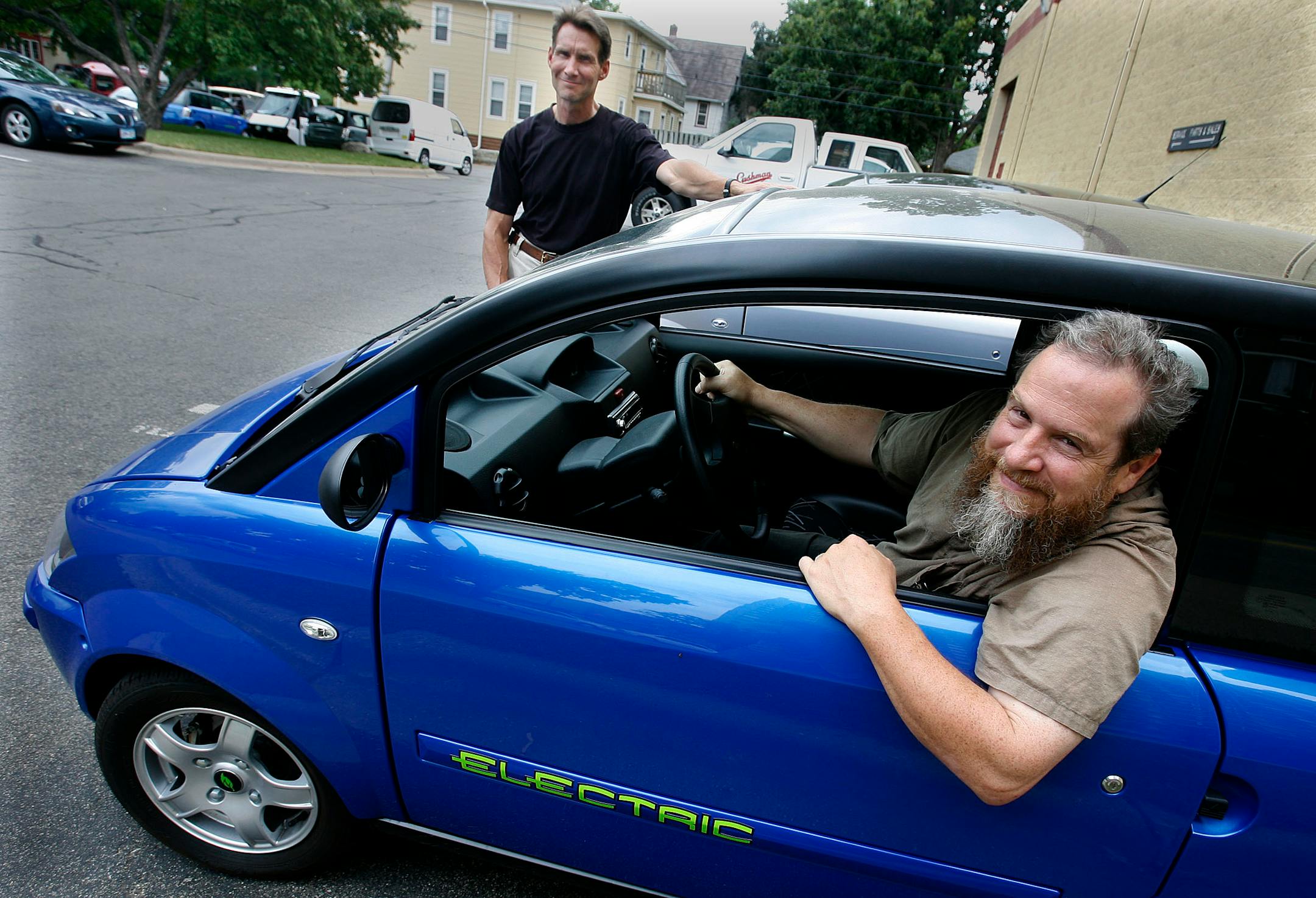 "It works as advertised or better," said Josh Harkness, shown in a 2008 Zenn car. "I unplug the toaster oven and plug in the car."