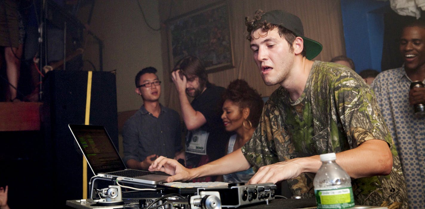 FILE -- DJ Baauer performs at the Glasslands Gallery in the Brooklyn borough of New York, Sept. 1, 2012. Macklemore's "Thrift Shop" and Baauer's "Harlem Shake" are wildly popular in 2013, signifying either a tremendous cultural victory for hip-hop or the moment when hip-hop has begun to lose its meaning. (Julie Glassberg/The New York Times)