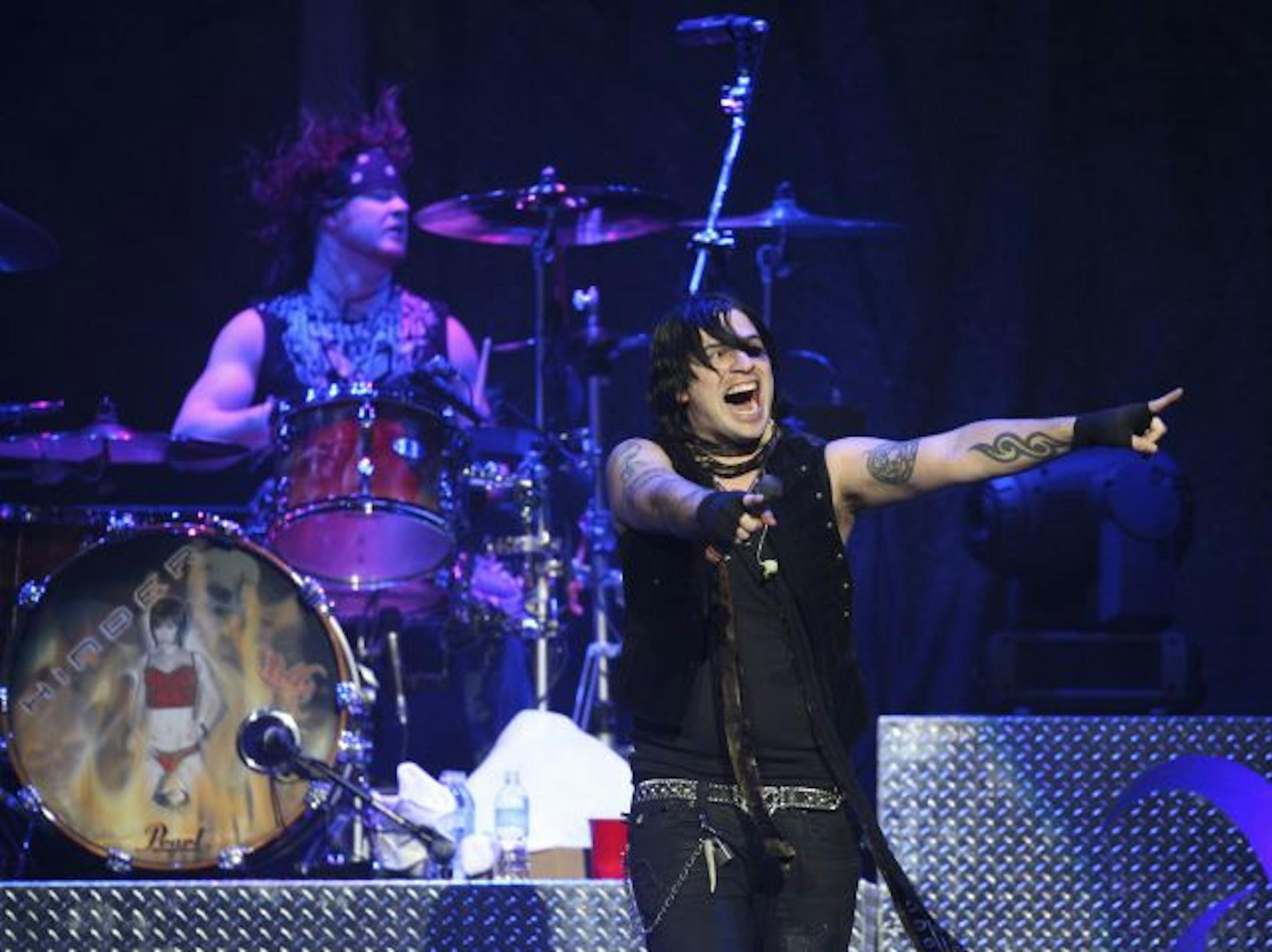 Opening for Mötley Crüe was Hinder — with founders Austin Winkler, foreground, and drummer Cody Hanson — an Oklahoma quartet with a recent string of hit power ballads.