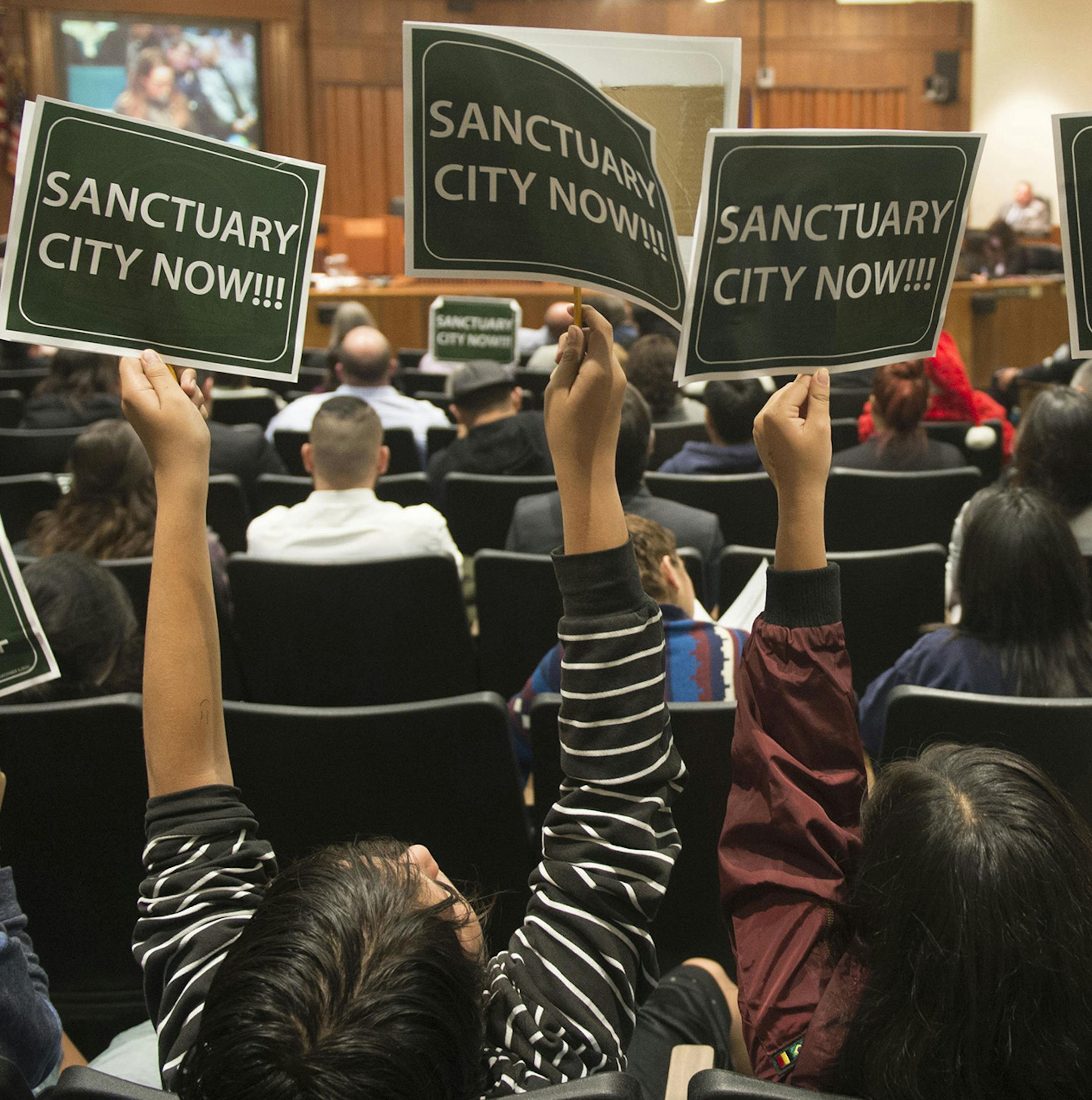Students show their support for a proposed ordinance declaring the city a sanctuary for all residents regardless of immigration status during the Santa Ana City Council meeting in Santa Ana, Calif., Tuesday, Dec. 20, 2016. (Kevin Sullivan/The Orange County Register via AP) ORG XMIT: MIN2017011614270670