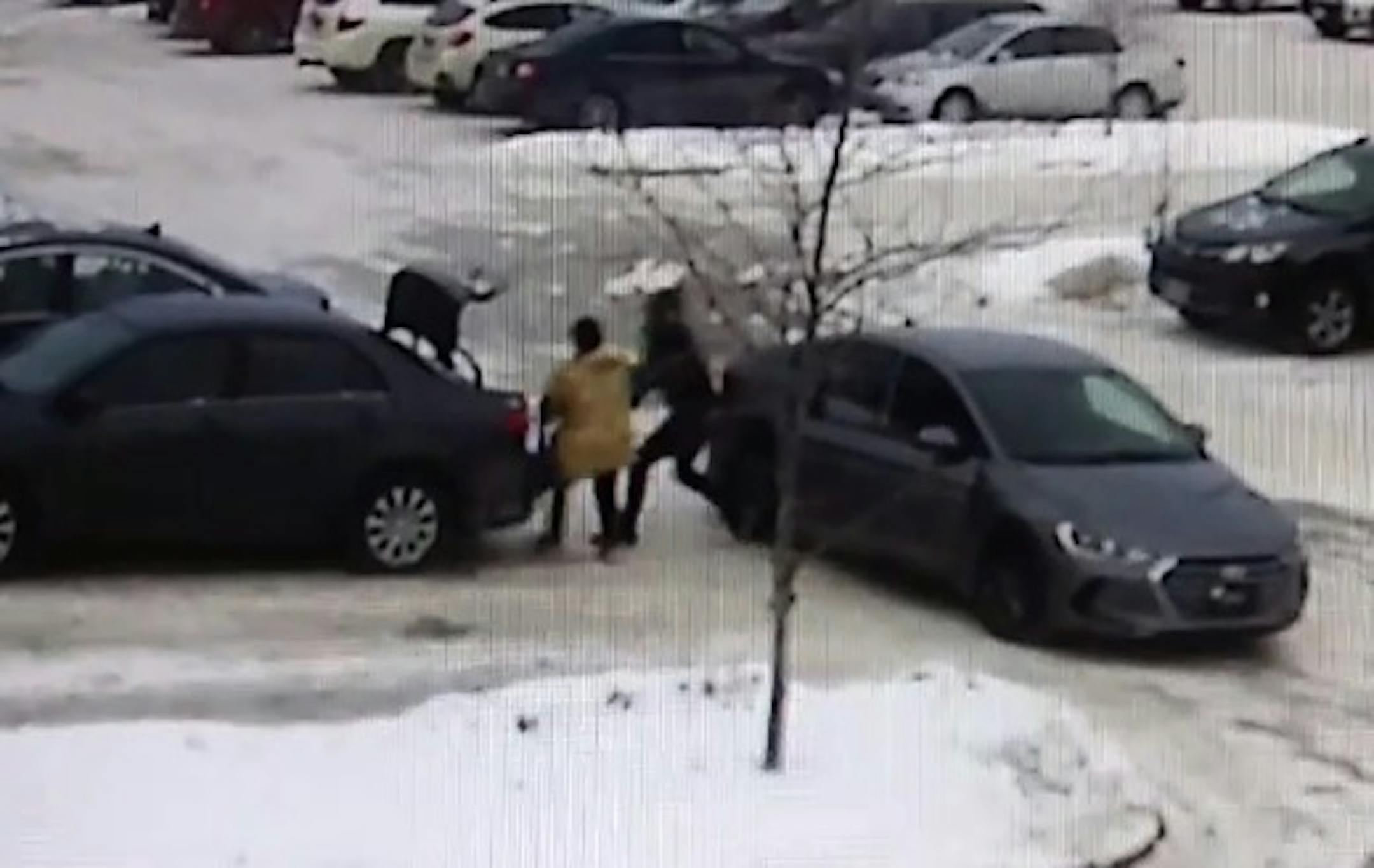 A woman was robbed and dragged in a robbery Sunday after she had finished shopping.