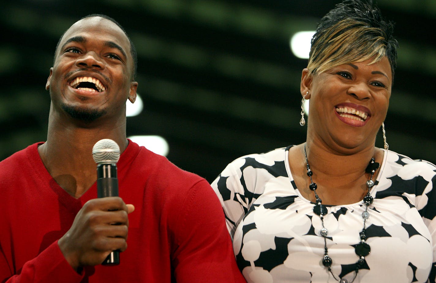 Vikings running back Adrian Peterson and his mother, Bonita Jackson, were all smiles as they talked about Peterson's younger years and the help his mother gave him as his athletic prowess developed.