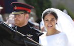 Britain's Prince Harry and his wife Meghan Markle leave after their wedding ceremony, at St. George's Chapel in Windsor Castle in Windsor, near London