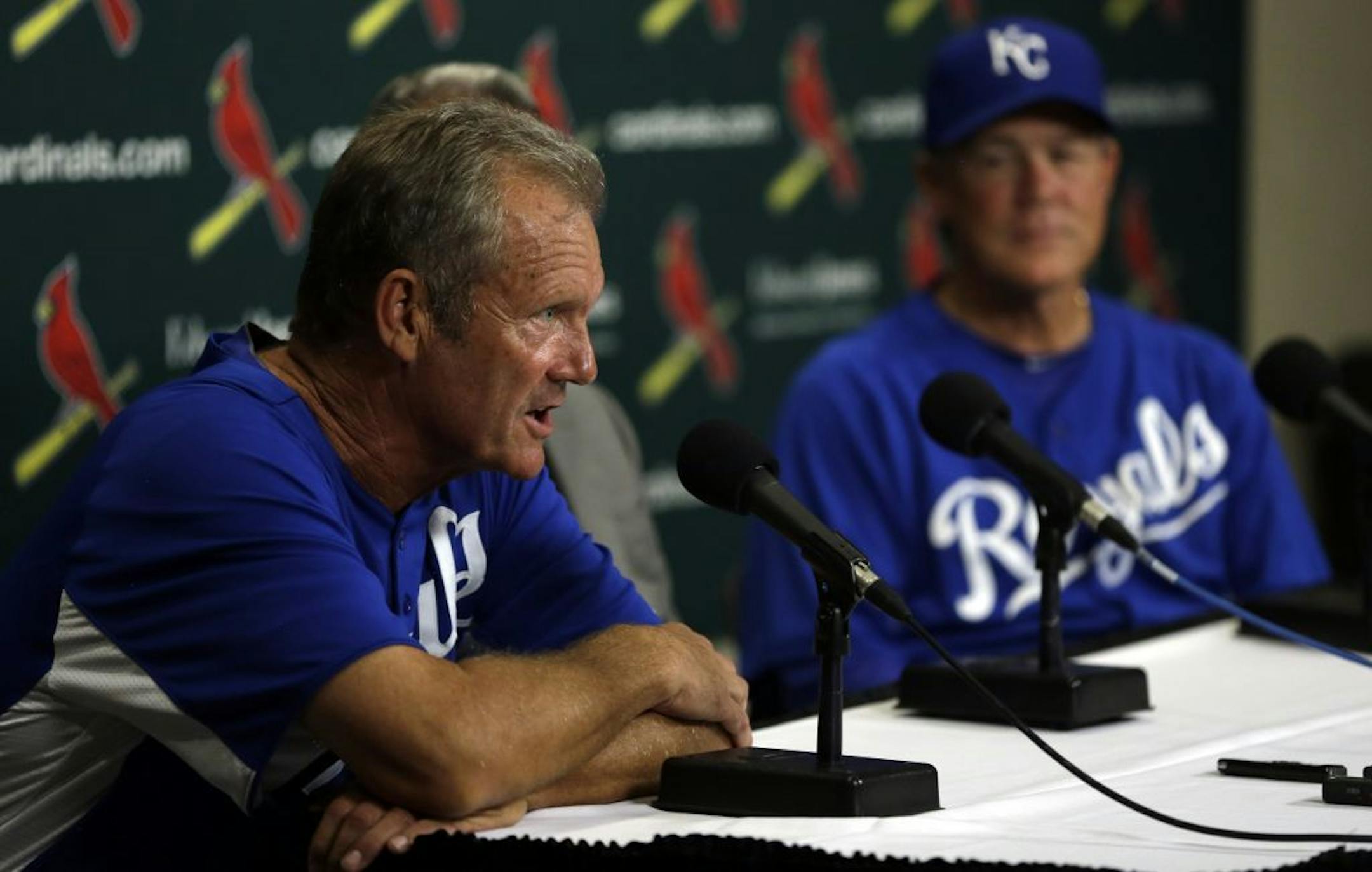 George Brett speaks during a news conference announcing him as the Royals interim hitting coach as manager Ned Yost, right, listens in.
