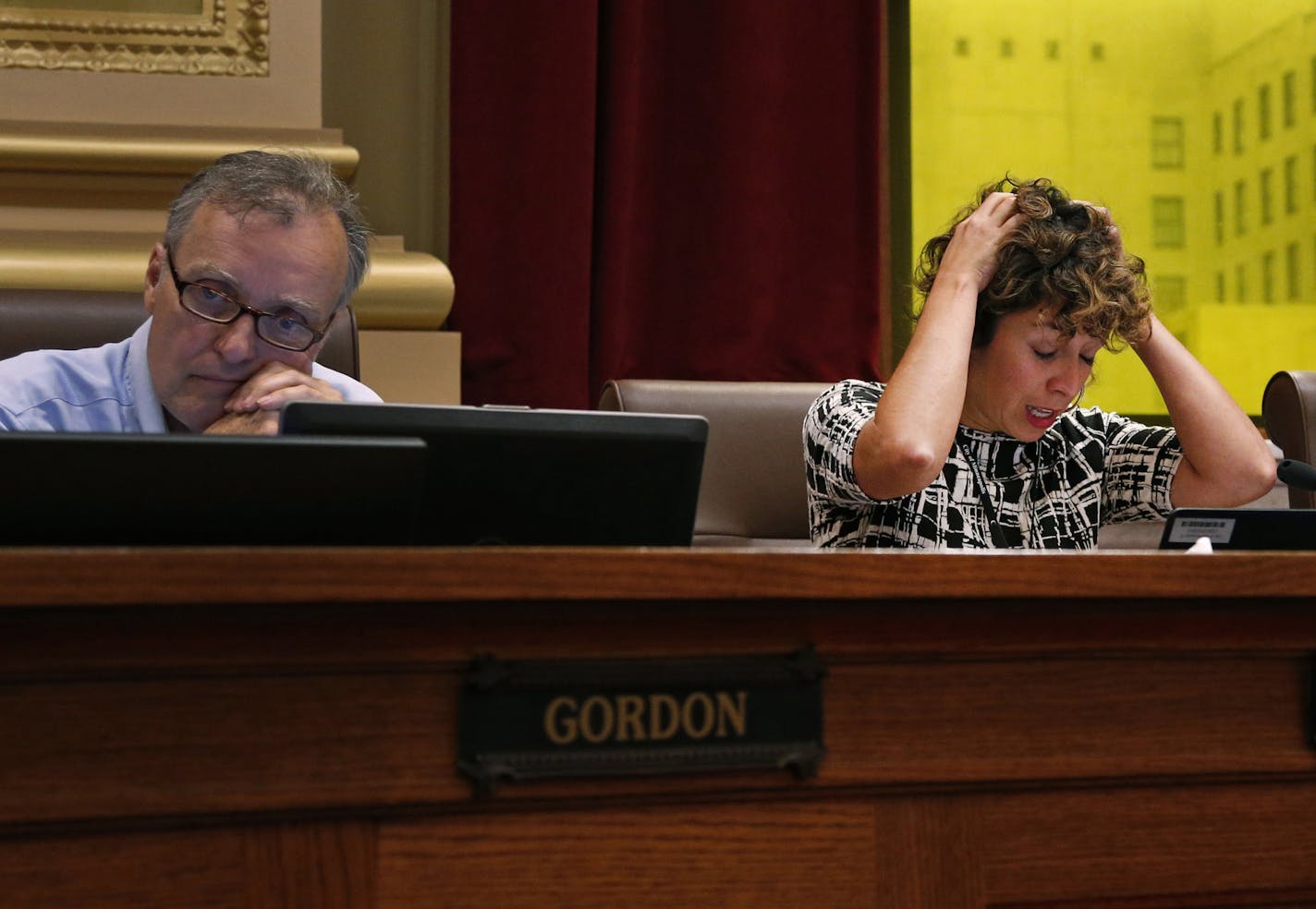 Council Member Alondra Cano, chair of the public safety committee, said she was &#xec;disgusted&#xee; with her colleagues supporting the amendment, accusing them of trying to rush the proposal to get it on the ballot this year and ignoring community and police input. To Cano's left sat Council Members Cam Grodon and Council Member Kevin Reich on the right. ] Shari L. Gross &#xef; shari.gross@startribune.com The Minneapolis City Council voted on whether to keep the charter amendment on police pow