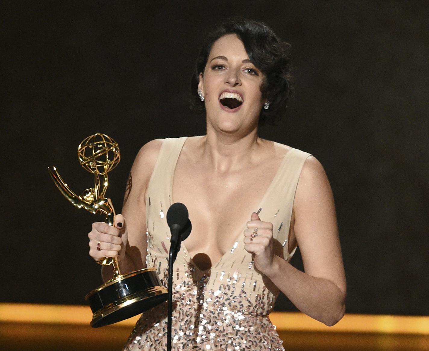 Phoebe Waller-Bridge accepts the award for outstanding writing for a comedy series for "Fleabag" at the 71st Primetime Emmy Awards on Sunday, Sept. 22, 2019, at the Microsoft Theater in Los Angeles. (Photo by Chris Pizzello/Invision/AP)