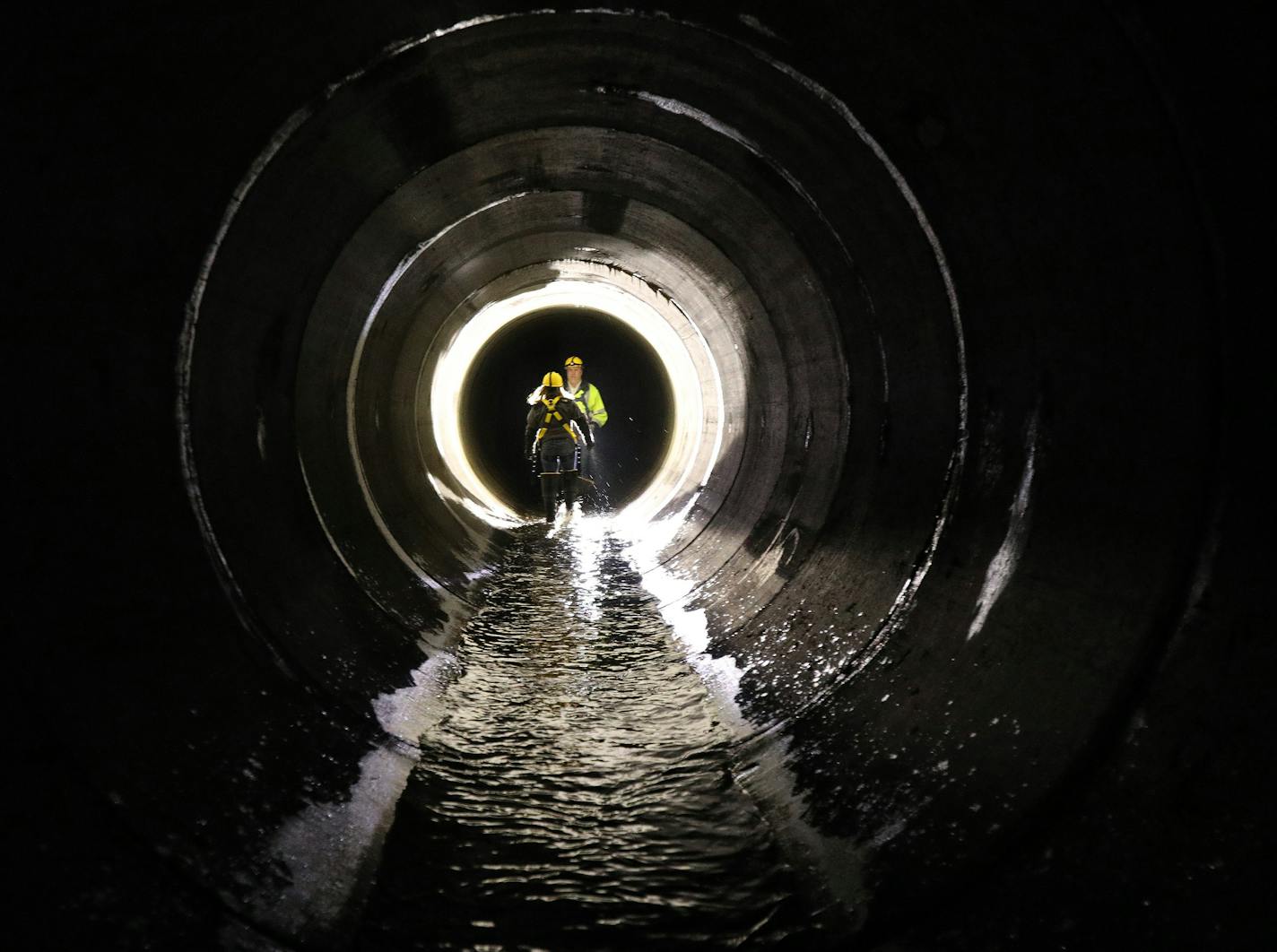 An underground web of tunnels beneath downtown Minneapolis channels stormwater to the Mississippi River. But with more concrete surfaces and bigger rains, the tunnels have reached their capacity.