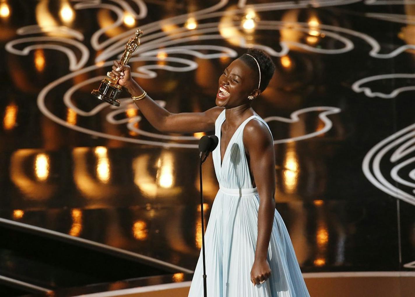 Lupita N'yongo on stage during the 86th annual Academy Awards on Sunday, March 2, 2014, at the Dolby Theatre at Hollywood & Highland Center in Los Angeles. (Robert Gauthier/Los Angeles Times/MCT) ORG XMIT: 1149851