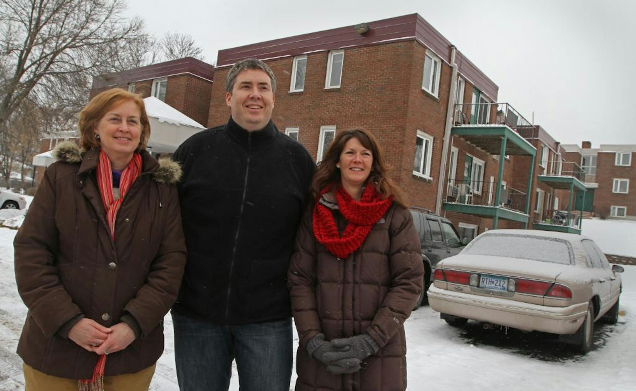 Carla Olson, property manager at Rolling Hills; Pat Connolly, of Lutheran Social Service; and Becky Landon, of Landon Group, at the Rolling Hills complex.