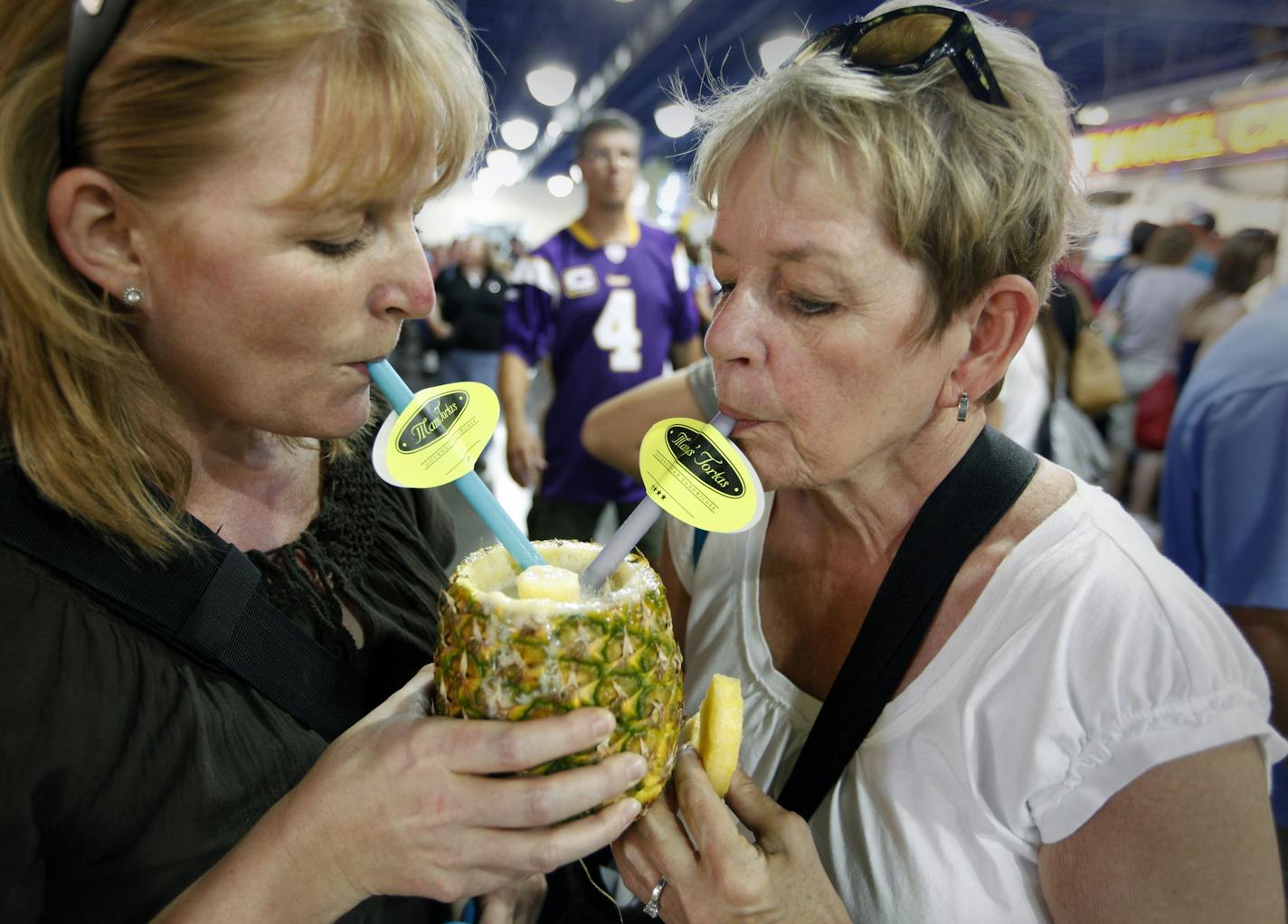 TOM WALLACE &#x2022; twallace@startribune.com Assignment #20013789A Slug: newfairfood082710 Date: august 26th, _Choices by Rick Nelson on new additions to the food lists to try at the Minnesota State Fair. THIS PHOTO: ] Pina Coladas at Manny's Tortas are enjoys by 30year fair fans. left Gretchen Vrieze and her Mom Joan Vrieze have made the fair a special day by going together by themselves for the last tewnty years.