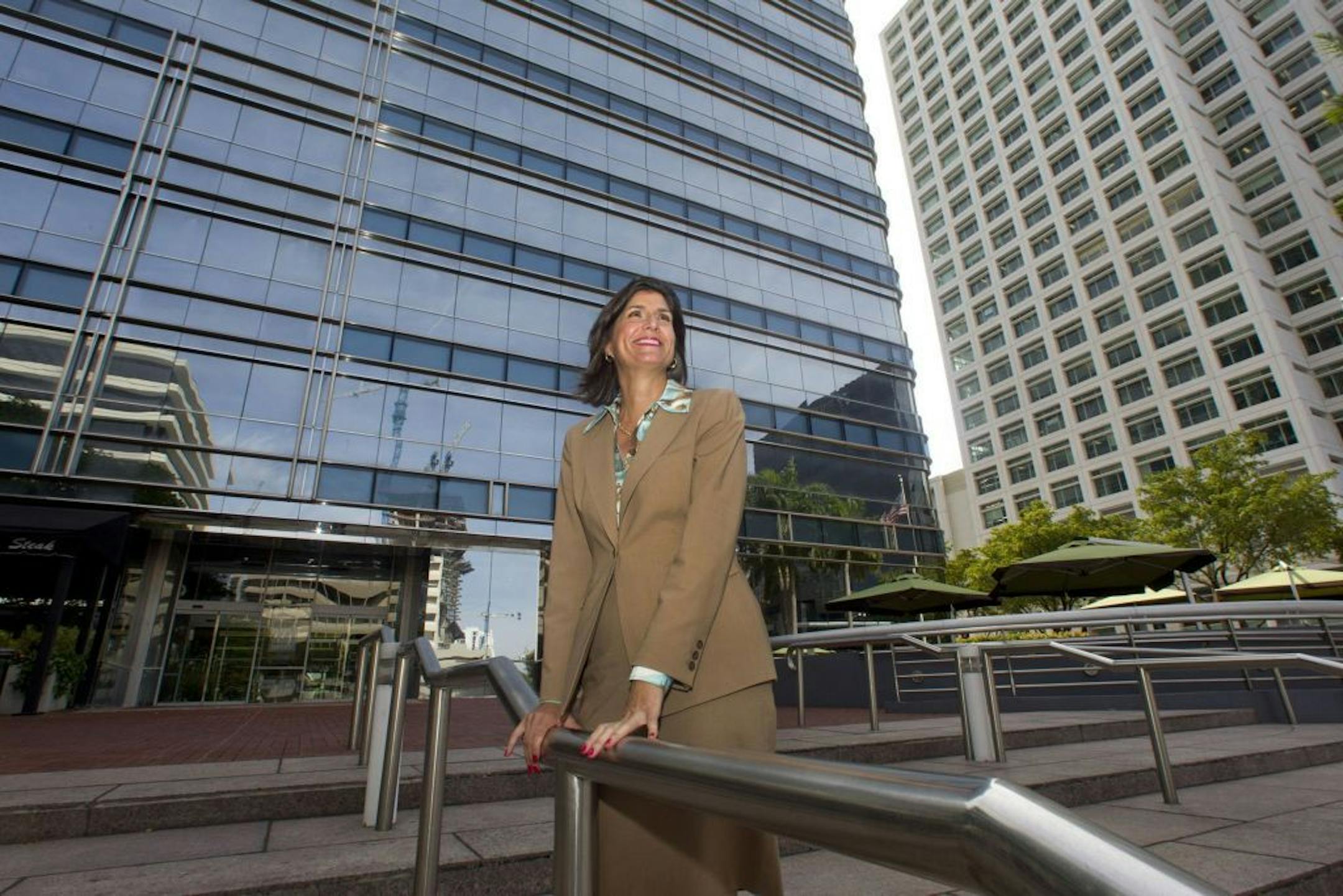 Mary Jo Eaton, executive managing director of CBRE, in front of the 777 Brickell Building, one of the properties the firm manages and where its Miami office is located.