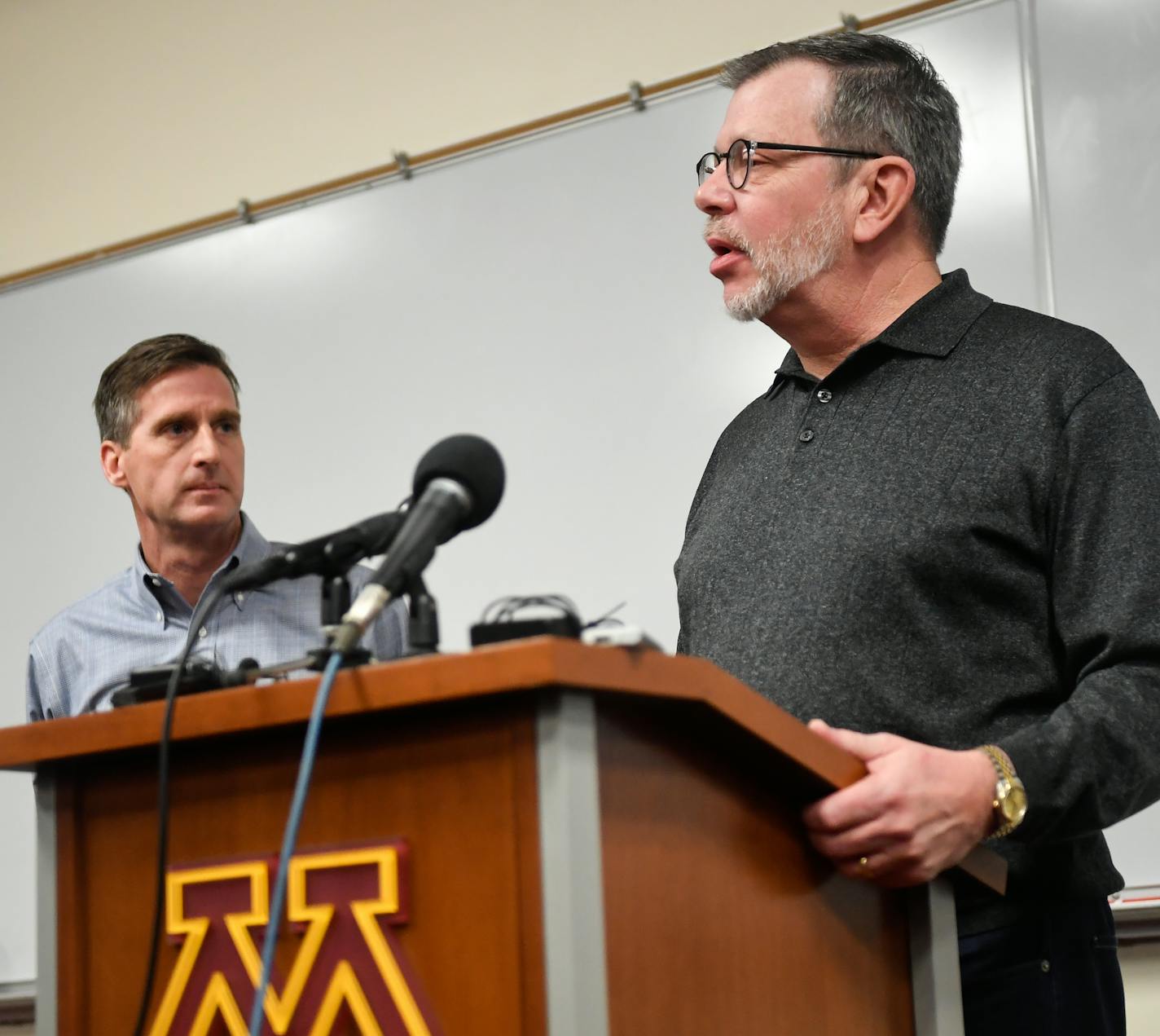 University of Minnesota President Eric Kaler spoke to the media Saturday after players announced the end of their boycott of the Holiday Bowl minutes before as Athletic Director Mark Coyle stood behind. ] (AARON LAVINSKY/STAR TRIBUNE) aaron.lavinsky@startribune.com University of Minnesota President Eric Kaler and Athletic Director Mark Coyle addressed the media at the Gibson-Nagurski Football Complex on Saturday, Dec. 17, 2016 in Minneapolis, Minn.