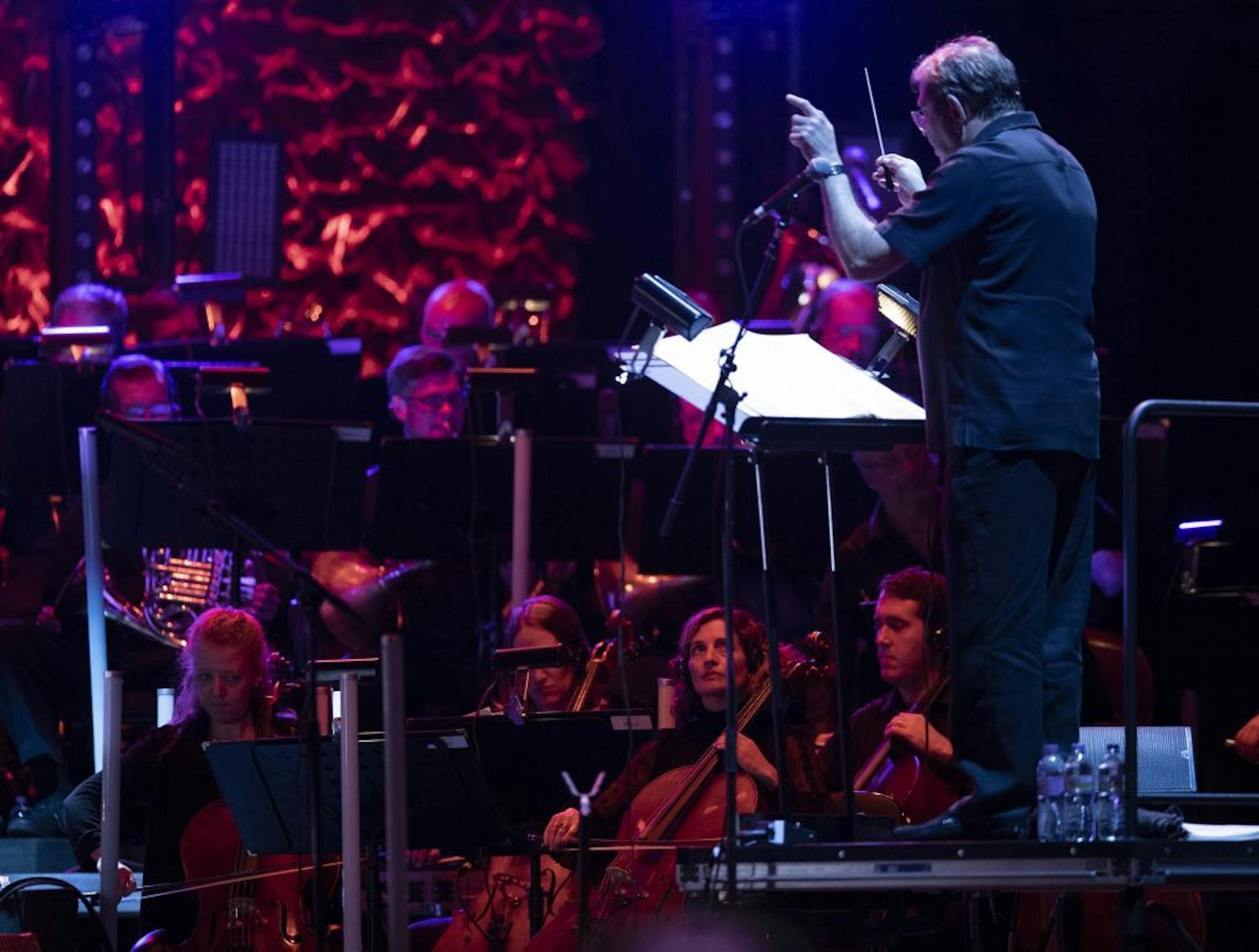 The orchestra backing The Who was made up of local players, shown here during Amazing Journey early in The Who's show at Xcel Friday night.