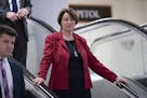 Sen. Amy Klobuchar, D-Minn., and other members of the Senate head to a closed-door briefing to update lawmakers on cyber attacks on the U.S. election 