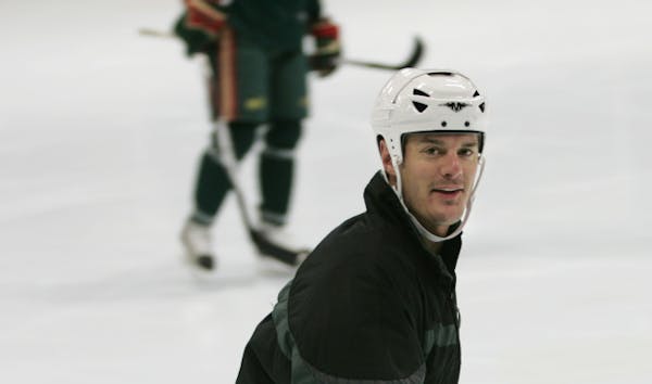 Minnesota Wild defenseman Kurtis Foster had reason to smile after getting back on the ice to skate Wednesday at the Parade Ice Garden. Foster suffered