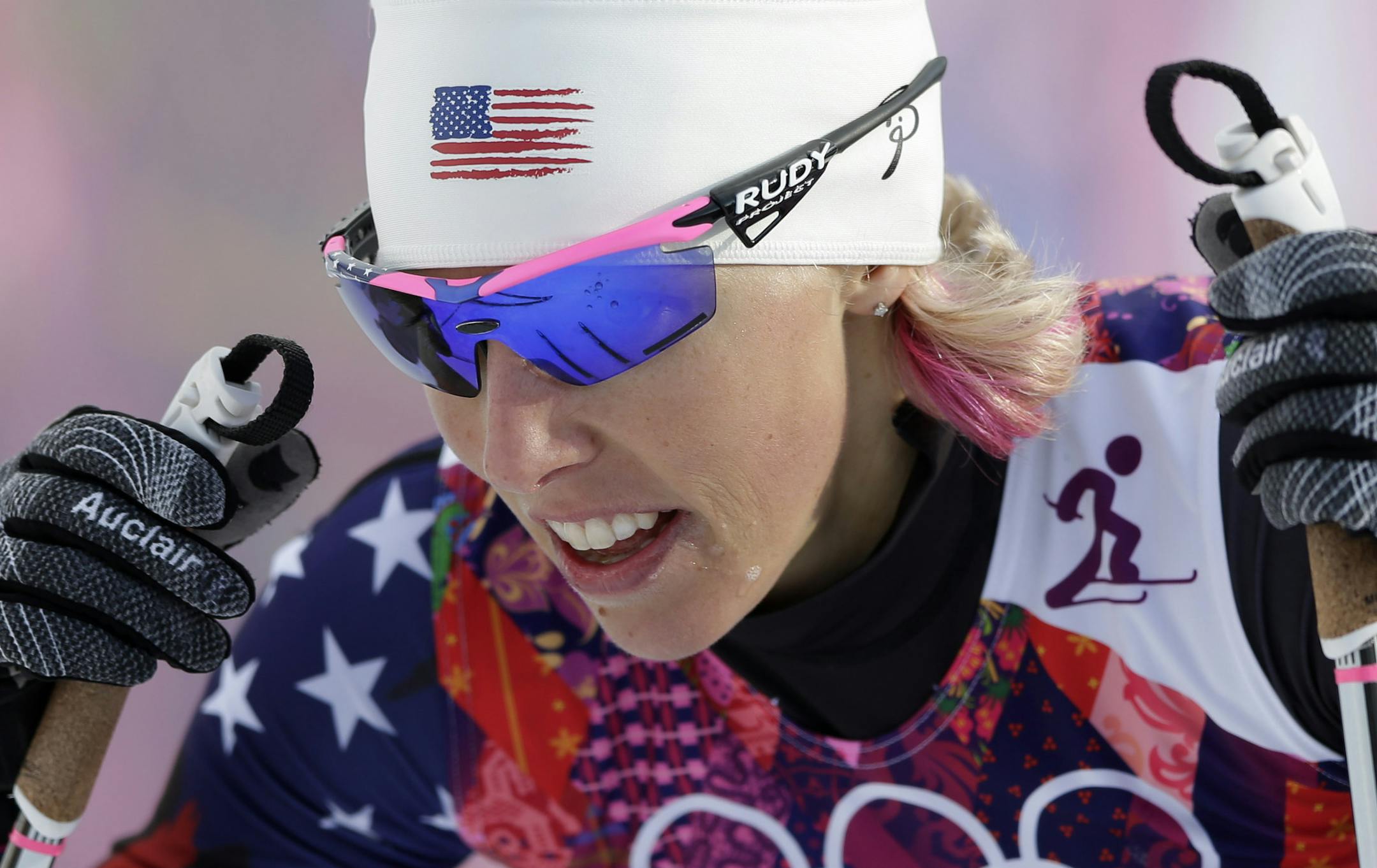 United States' Kikkan Randall catches her breath after her women's quarterfinal heat of the cross-country sprint at the 2014 Winter Olympics, Tuesday, Feb. 11, 2014, in Krasnaya Polyana, Russia. (AP Photo/Matthias Schrader)