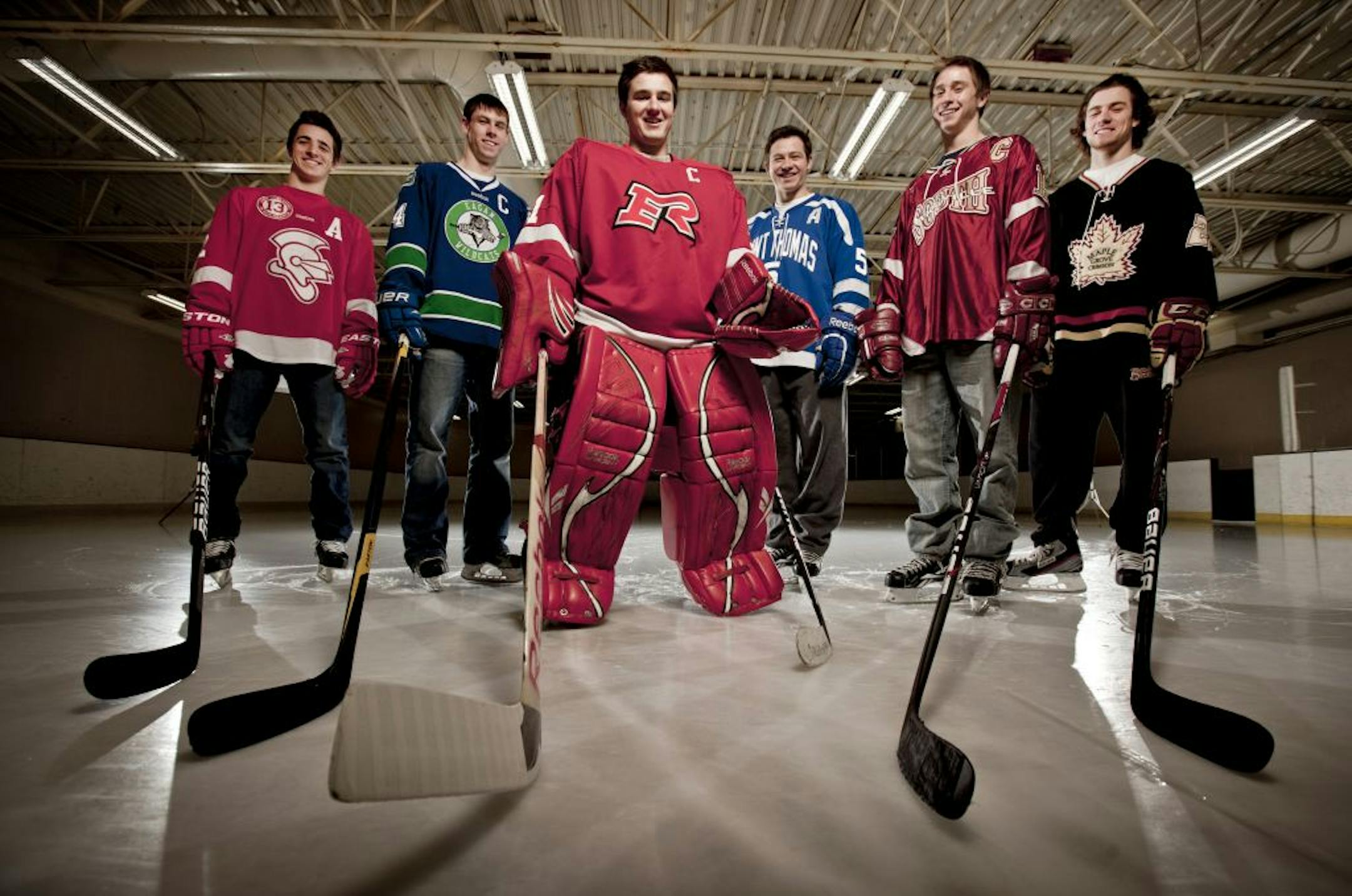 (L to R) Grant Besse, Benilde-St. Margaret's, Will Merchant, Eagan,Anders Franke, Elk River, Eric Schurhamer, St. Thomas Academy, Justin Kloos, Lakeville South (player of the year), Jordan Gross, Maple Grove, The All-metro boys hockey first team.