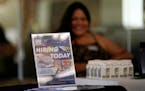 Minnesota’s unemployment rate ticked lower even after the state lost jobs in December.