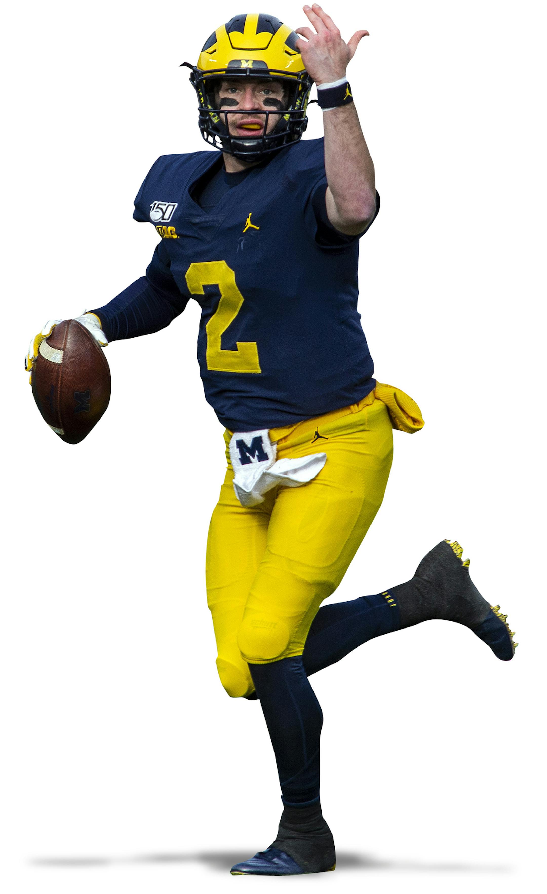 Michigan quarterback Shea Patterson (2) scrambles looking for a receiver in the third quarter of an NCAA college football game against Michigan State in Ann Arbor, Mich., Saturday, Nov. 16, 2019. Michigan won 44-10. (AP Photo/Tony Ding)