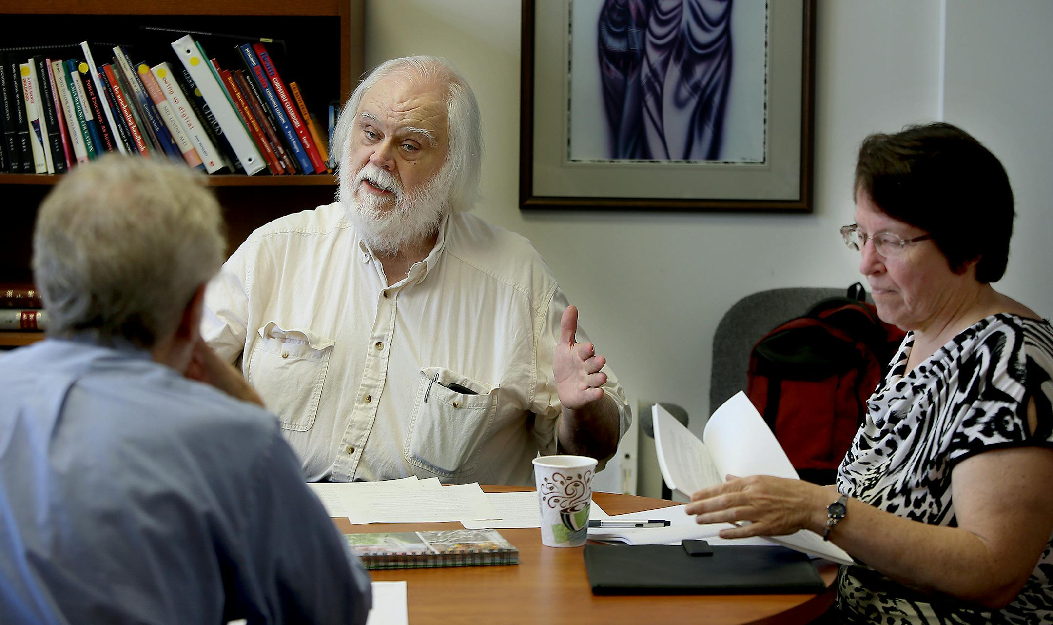 Vic Ward, 71, a web site developer, met with "SHIFT," members, including David Alley, left, and Kirin Loomis, cq, Thursday, July 3, 2014 in St. Paul, MN. ] (ELIZABETH FLORES/STAR TRIBUNE) ELIZABETH FLORES • eflores@startribune.com