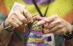 Kay Crowthers of the MN Knitter's Guild works on a pair of mittens during Vogue Knitting Live. ] (Leila Navidi/Star Tribune) leila.navidi@startribune.
