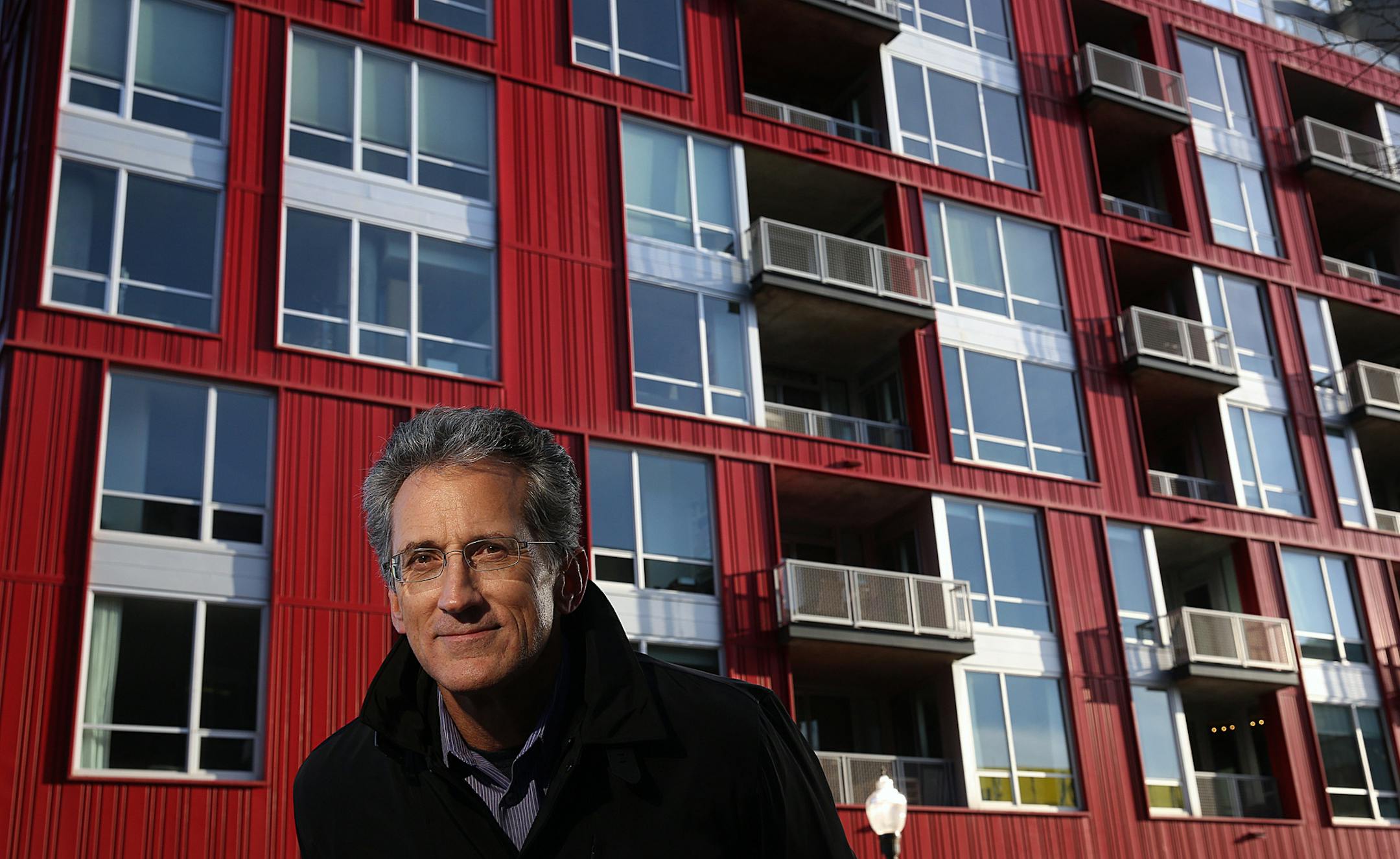 David Graham, is design principal and director of the residential design practice at ESG Architects in Minneapolis (pictured in front of a residential over commercial building that his company designed in downtown Minneapolis. ] (JIM GEHRZ/STAR TRIBUNE) / November 22, 2013Minneapolis, MN