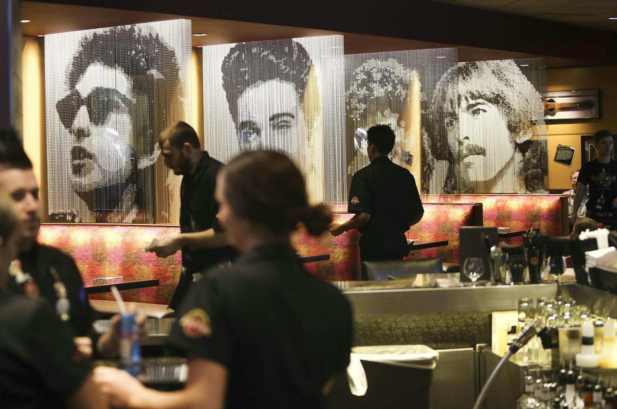 Individual dining booths seperated with the likenesses of Rock icons like Bob Dylan at the new Hard Rock Cafe that opened in the Mall of America last week and seen Wednesday, Sept. 3, 201, Bloomington, MN. The newly opened restaurant features museum quality Rock memorabilia from the likes of Prince, Bob Dylan, Nirvana and many more.] (DAVID JOLES/STARTRIBUNE)djoles@startribune.com Hard Rock Cafe opened last week at Mall of America after closing its Block E location several years ago. The theme r