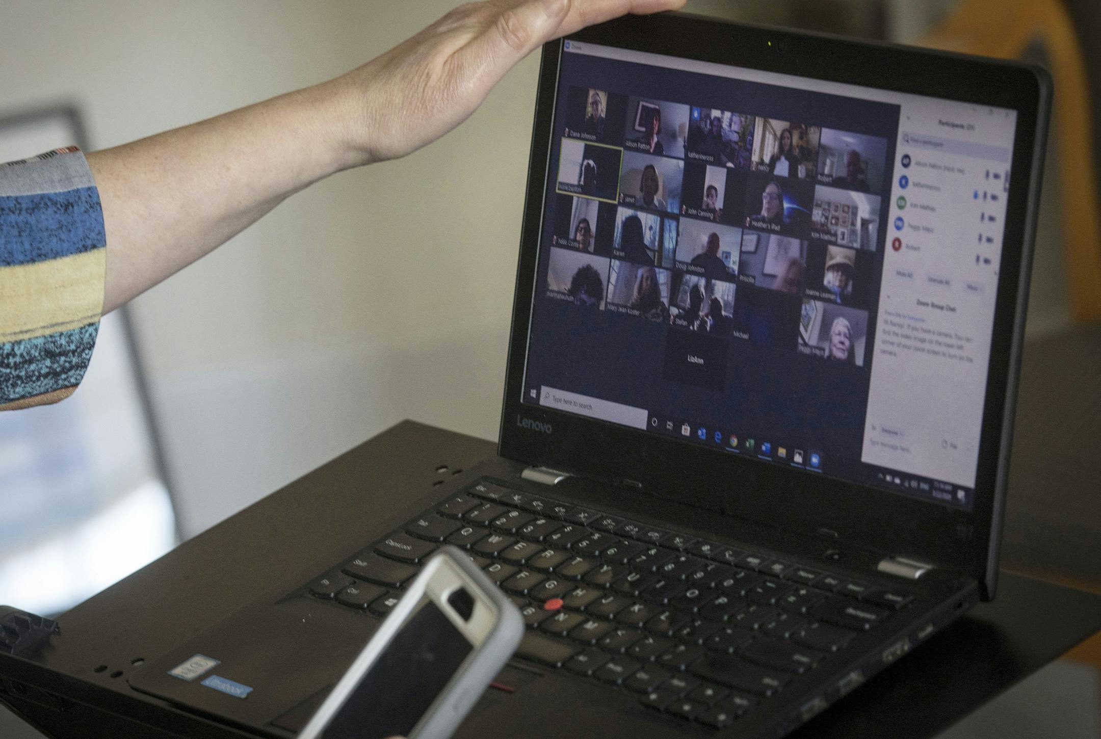 FILE -- Rev. Alison Buttrick Patton leads an online Fellowship hour with parishioners using the Zoom videoconferencing app, from her office at Saugatuck Congregational Church in Westport, Conn., March 22, 2020. Zoom, whose traffic has surged during the coronavirus pandemic, is under scrutiny by the office of New York&#x2019;s attorney general, Letitia James, for its data privacy and security practices. (Dave Sanders/The New York Times)