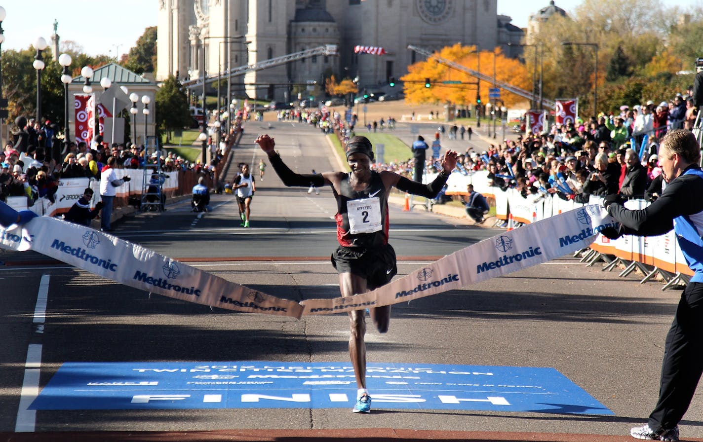 Runner Chris Kipyego made his way to the finish line to win the Medtronic Twin Cities Marathon with a time of 2:14:55 on Sunday.