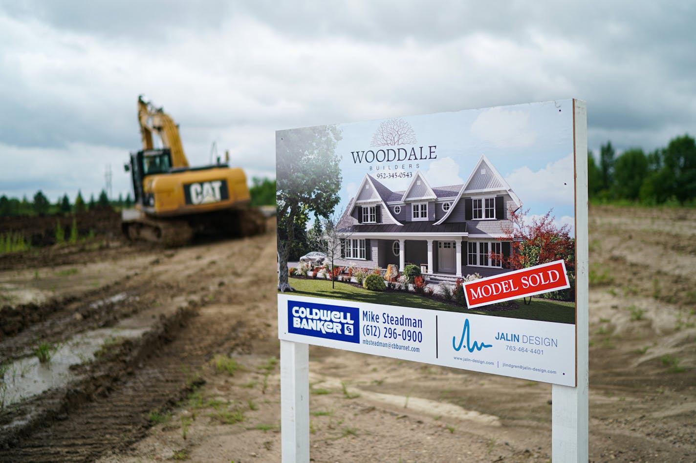 The Deer Hill development in Orono features large lots and upper end homes. ] GLEN STUBBE &#x2022; glen.stubbe@startribune.com Thursday, July 18, 2019 EDS, Liam wears black shirt and shorts, Jeffrey Dewing is in blue shirt and slacks.