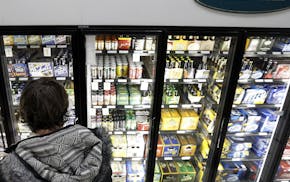 Christopher Hunt, 32, of Minneapolis shopped for beer at Surdyk's in Northeast Minneapolis.