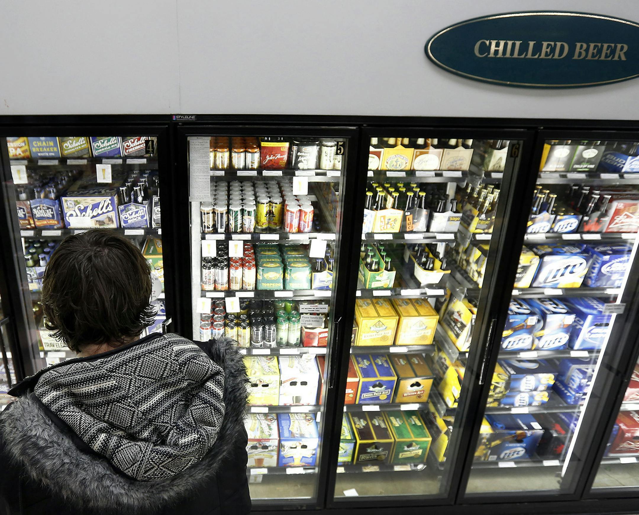 Christopher Hunt, 32, of Minneapolis shopped for beer at Surdyk's in Northeast Minneapolis.
