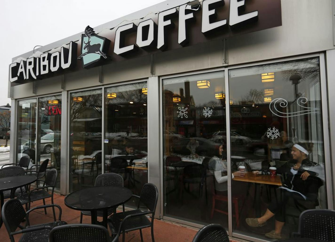 At the Caribou Coffee on Grand Avenue in St. Paul, regular customers Aubree Neuville and Hannah Bilodeau, right, enjoyed their drinks on Monday.