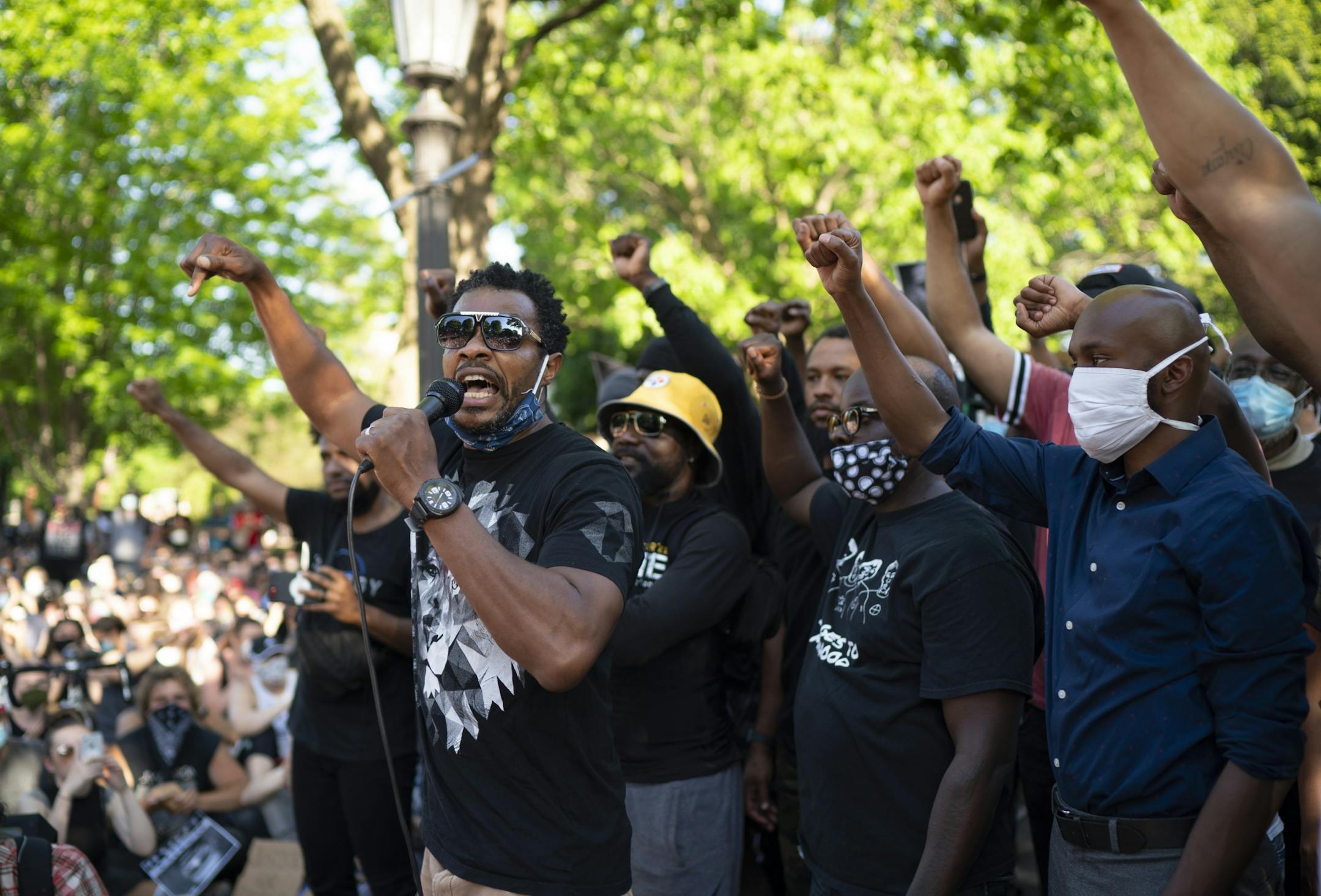 One of the final speakers, Marques Armstrong, addressed the crowd seated on Summit Ave.