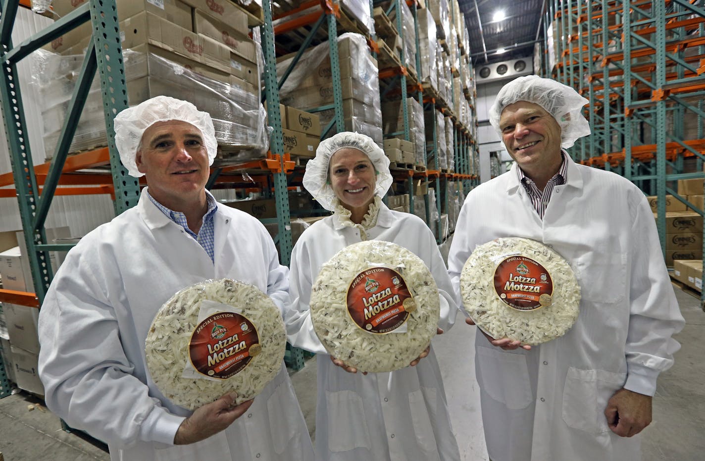 (left to right) Bernatello's Foods Dave Ramsay, owner and vice president, JJ Halverson, Marketing Director and Jim Cousin, General Manager, photographed on 10/16/13 at the Maple Lake pizza production plant. Whiteboard on Bernatello's pizza, maker of frozen pizzas that competes with the giants of the industry -- Nestle, Scwhan's and General Mills --- in the Minnesota market, as well as small local pizza makers. The "whiteboard" innovation focuses on their new "Brew Pub" line of pizzas, sort of th