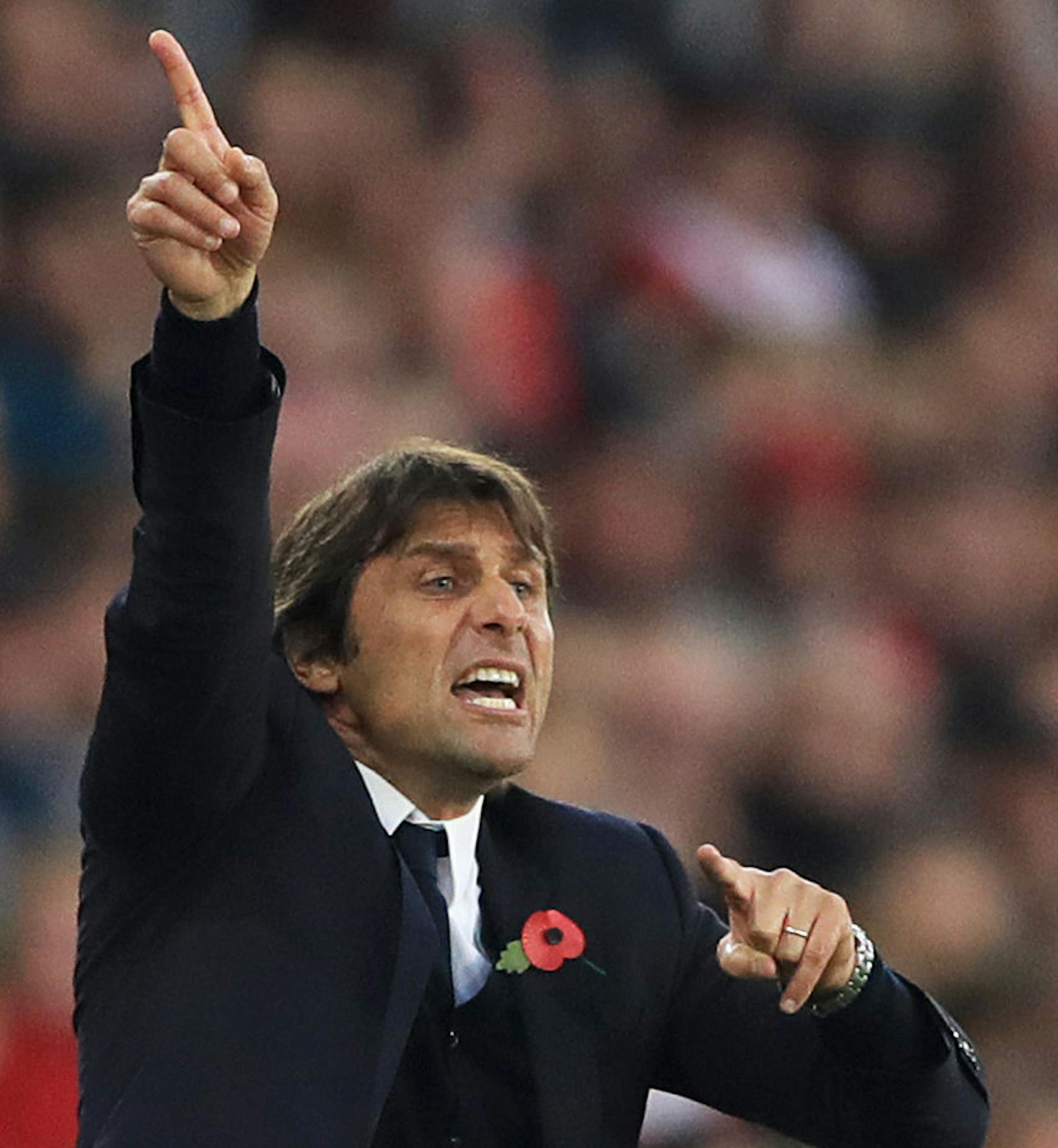 Chelsea manager Antonio Conte signals to players during their match against Southampton during their English Premier League soccer match at St Mary's Stadium in Southampton, England, Sunday Oct. 30, 2016. (John Walton / PA via AP) ORG XMIT: MIN2016112517154933