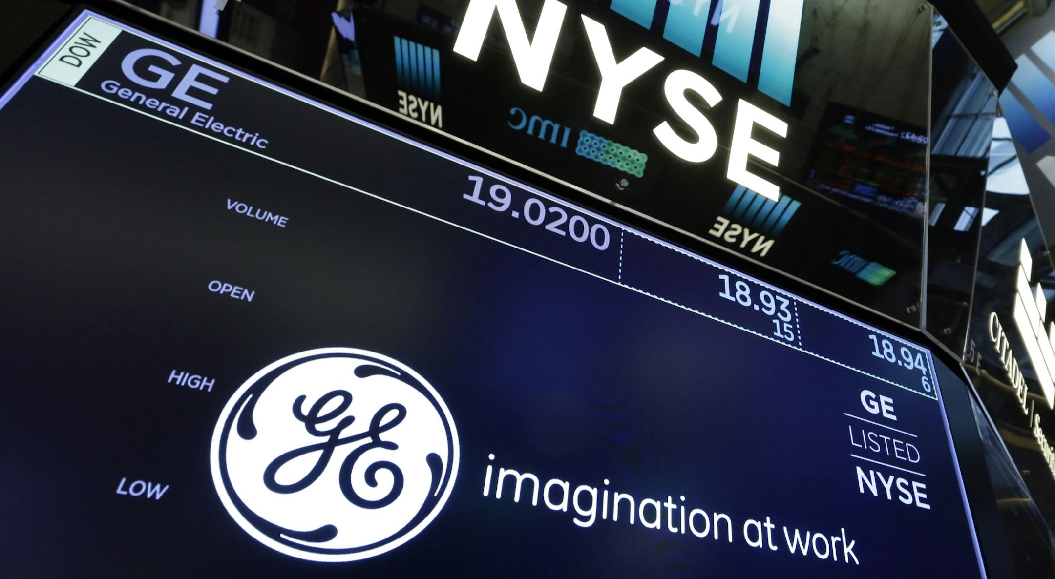 The logo for General Electric appears above a trading post on the floor of the New York Stock Exchange, Tuesday, Nov. 14, 2017. Stocks are opening lower on Wall Street as technology companies, banks and retailers sink. (AP Photo/Richard Drew)