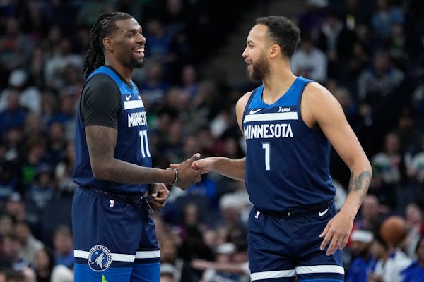 Timberwolves teammates Naz Reid and Kyle Anderson