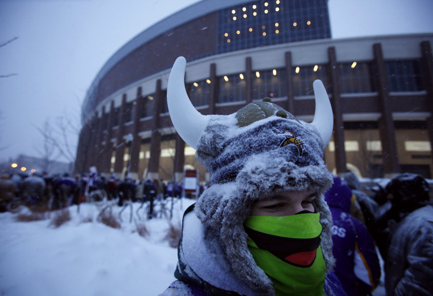 jgholt@startribune.com Minneapolis, MN 12/20/2010 Jerry Holt---- Chicago Bears @ Minnesota Vikings at TCF Bank Stadium . . .IN THIS PHOTO: ] Jordan Shomper of Harrisburg PA, waited with his father Brian Kemz outside of TCF Bank Stadium before Monday night football kickoff between the Vikings and Chicago Bears.