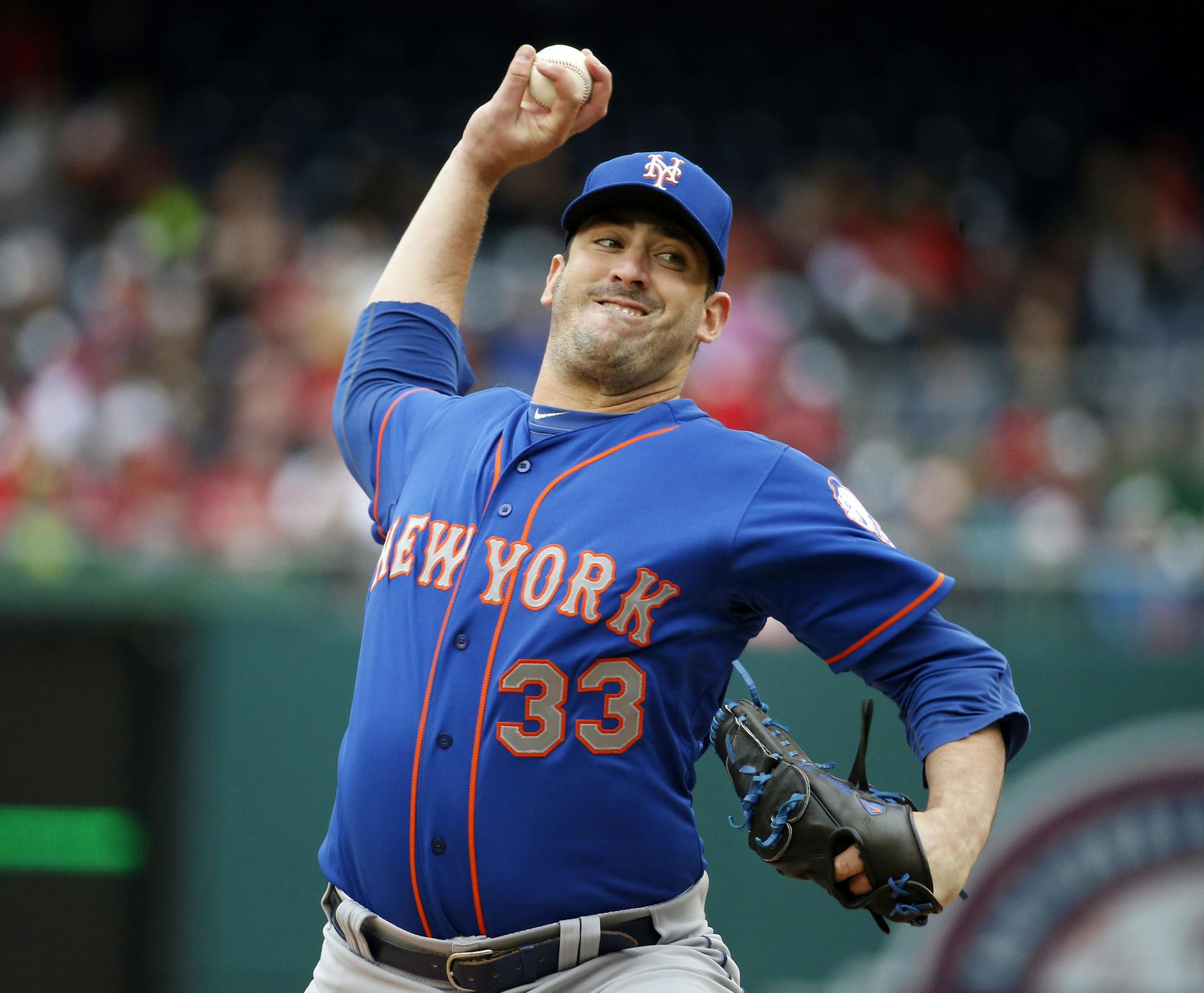 New York Mets starting pitcher Matt Harvey (33) throws during a baseball game against the Washington Nationals at Nationals Park, Thursday, April 9, 2015, in Washington. (AP Photo/Alex Brandon)
