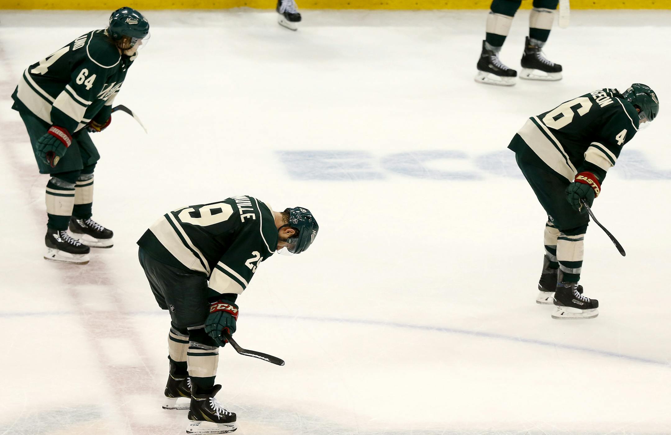 Mikael Granlund (64), Jason Pominville (29) and Jared Spurgeon (46) at the end of the game ] CARLOS GONZALEZ cgonzalez@startribune.com - April 24, 2016, St. Paul, MN, Xcel Energy Center, NHL, Hockey, Minnesota Wild vs. Dallas Stars, First Round Stanley Cup Playoffs, Game 6