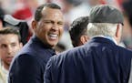 Alex Rodriguez talks with Terry Bradshaw before the NFL Super Bowl 54 football game between the San Francisco 49ers and Kansas City Chiefs Sunday, Feb