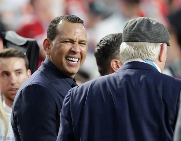 Alex Rodriguez talks with Terry Bradshaw before the NFL Super Bowl 54 football game between the San Francisco 49ers and Kansas City Chiefs Sunday, Feb