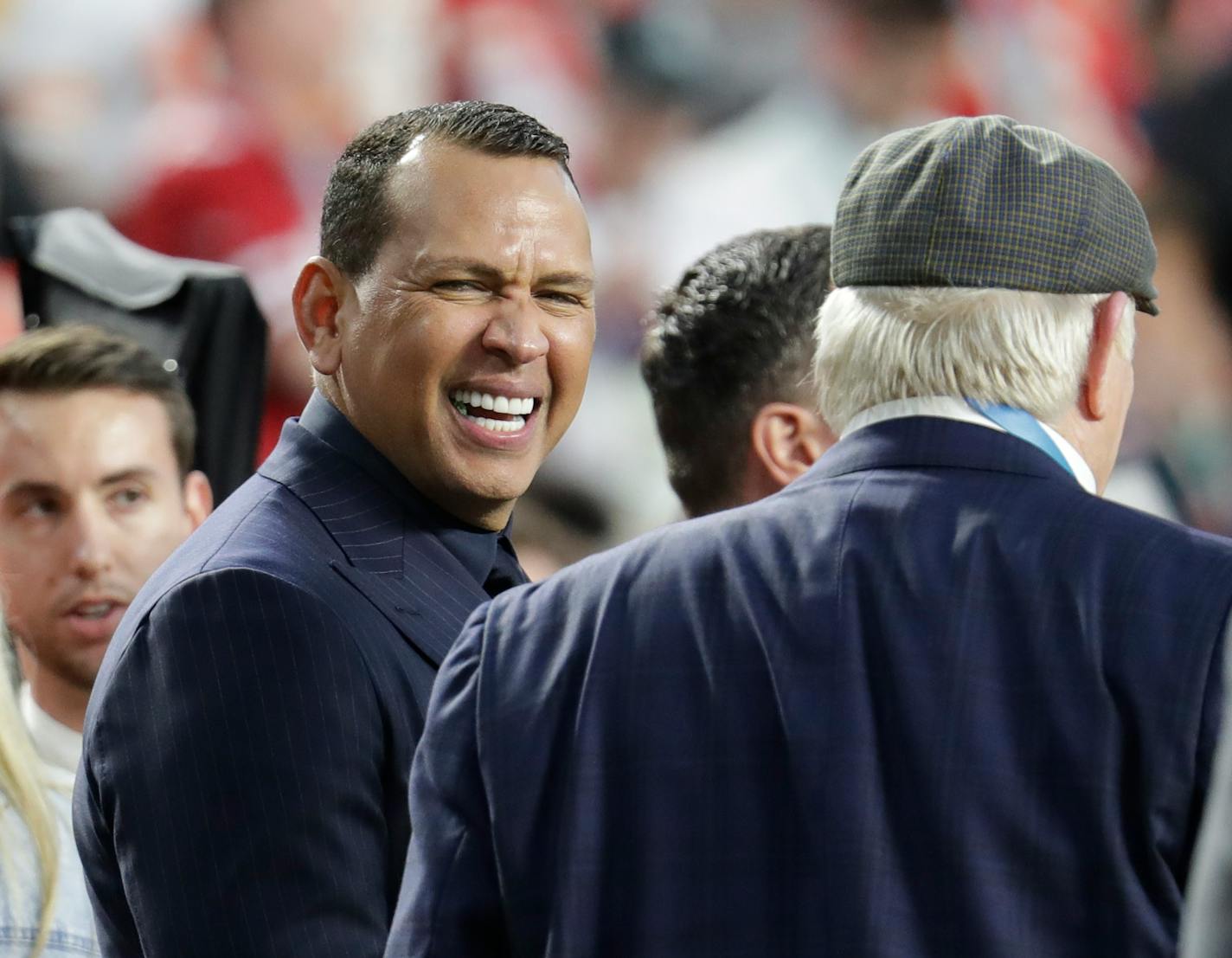 Alex Rodriguez talks with Terry Bradshaw before the NFL Super Bowl 54 football game between the San Francisco 49ers and Kansas City Chiefs Sunday, Feb. 2, 2020, in Miami Gardens, Fla. (AP Photo/Lynne Sladky)