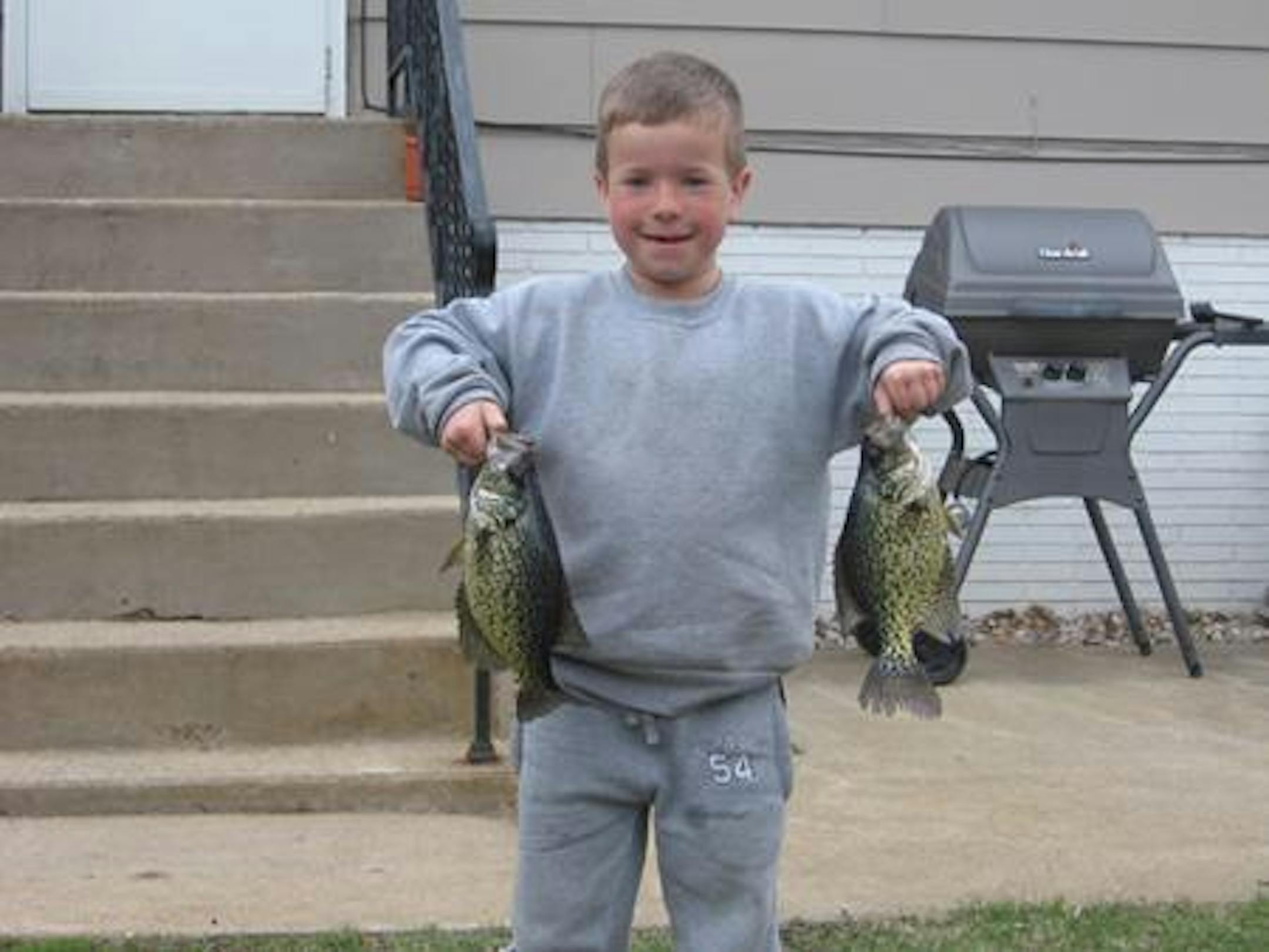 Conner Hittle with two nice Crappies in the Alexandria area.