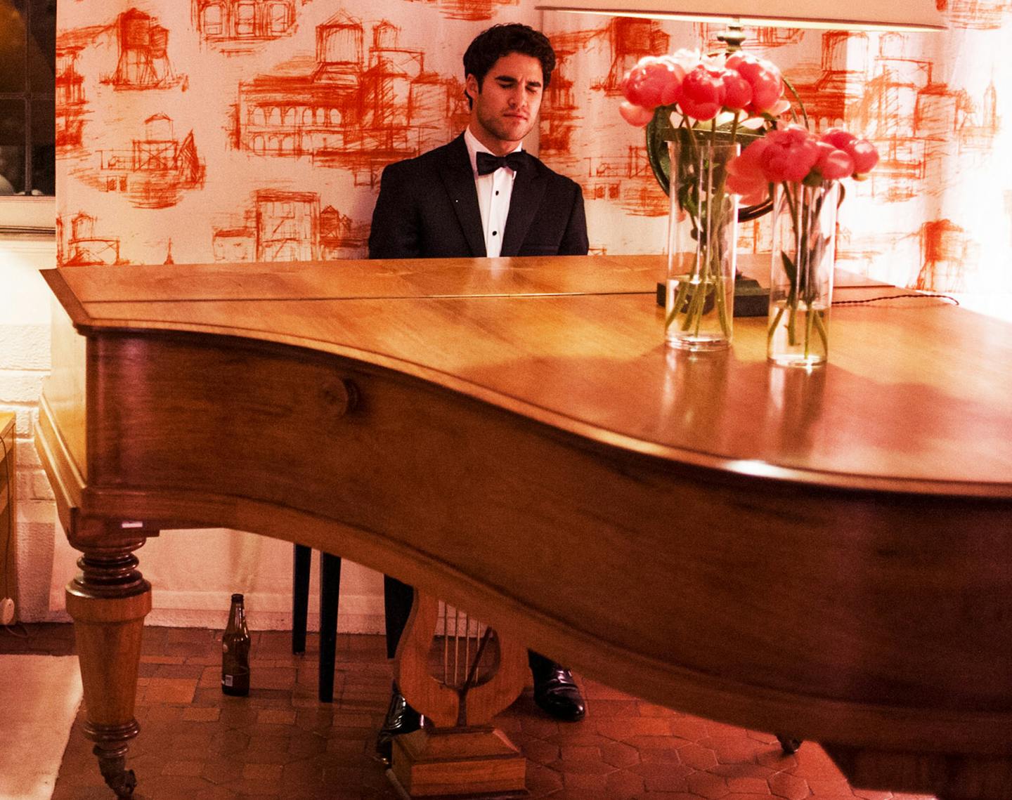 Actor Darren Criss plays the piano at the Vanity Fair/Bloomberg White House Correspondents' Association Dinner afterparty, at the residence of the French Ambassador in Washington, April 28, 2013. (Matt Roth/The New York Times) ORG XMIT: MIN2013060414180574