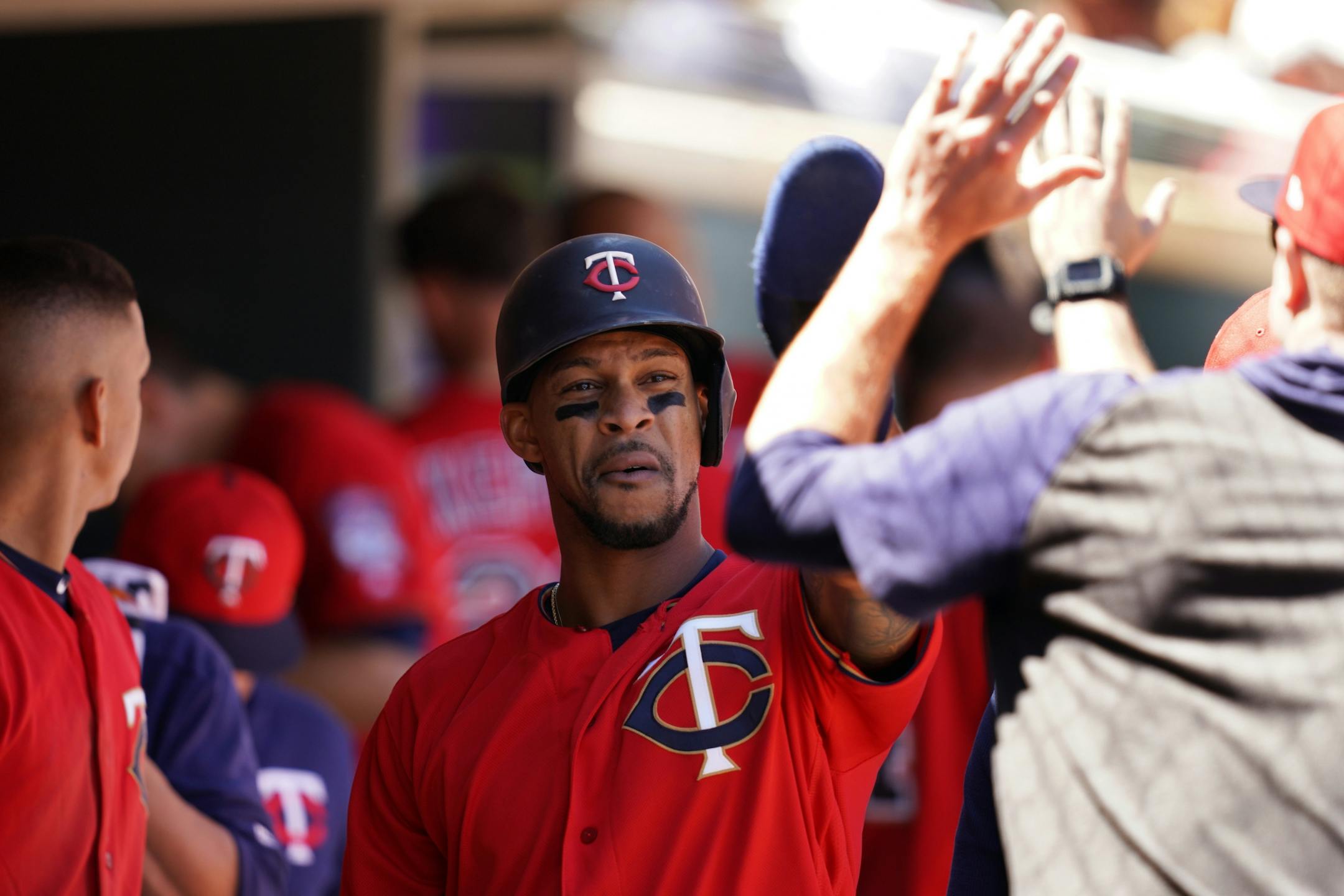 Minnesota Twins center fielder Byron Buxton (25) celebrated with his teammates in the dugout after scoring in the sixth inning.