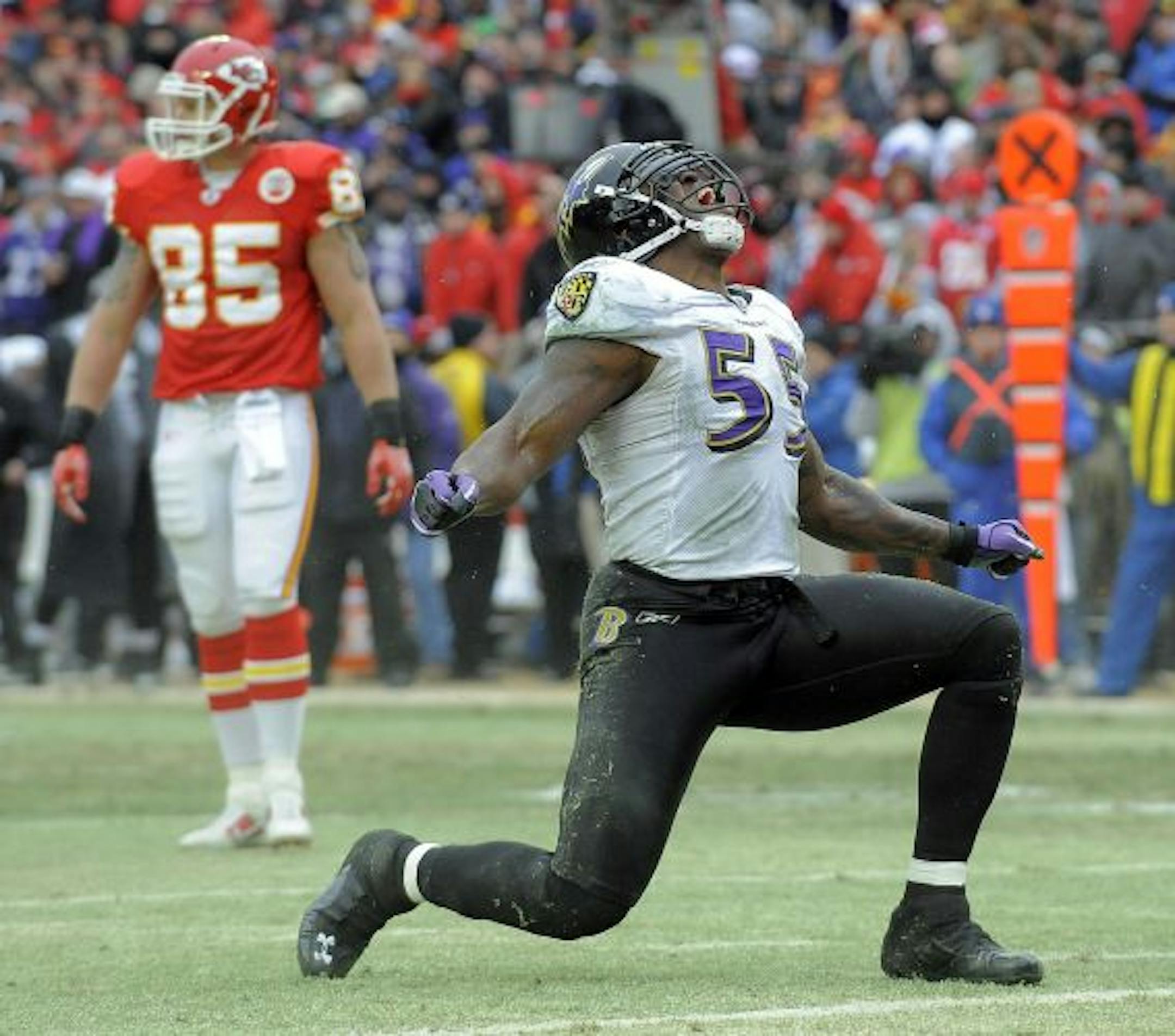 Baltimore Ravens linebacker Terrell Suggs reacts after sacking Kansas City Chiefs quarterback Matt Cassel in the third quarter. The Ravens defeated the Chiefs, 30-7, during an AFC wild-card game at Arrowhead Stadium in Kansas City, Missouri, on Sunday, January 9, 2011.